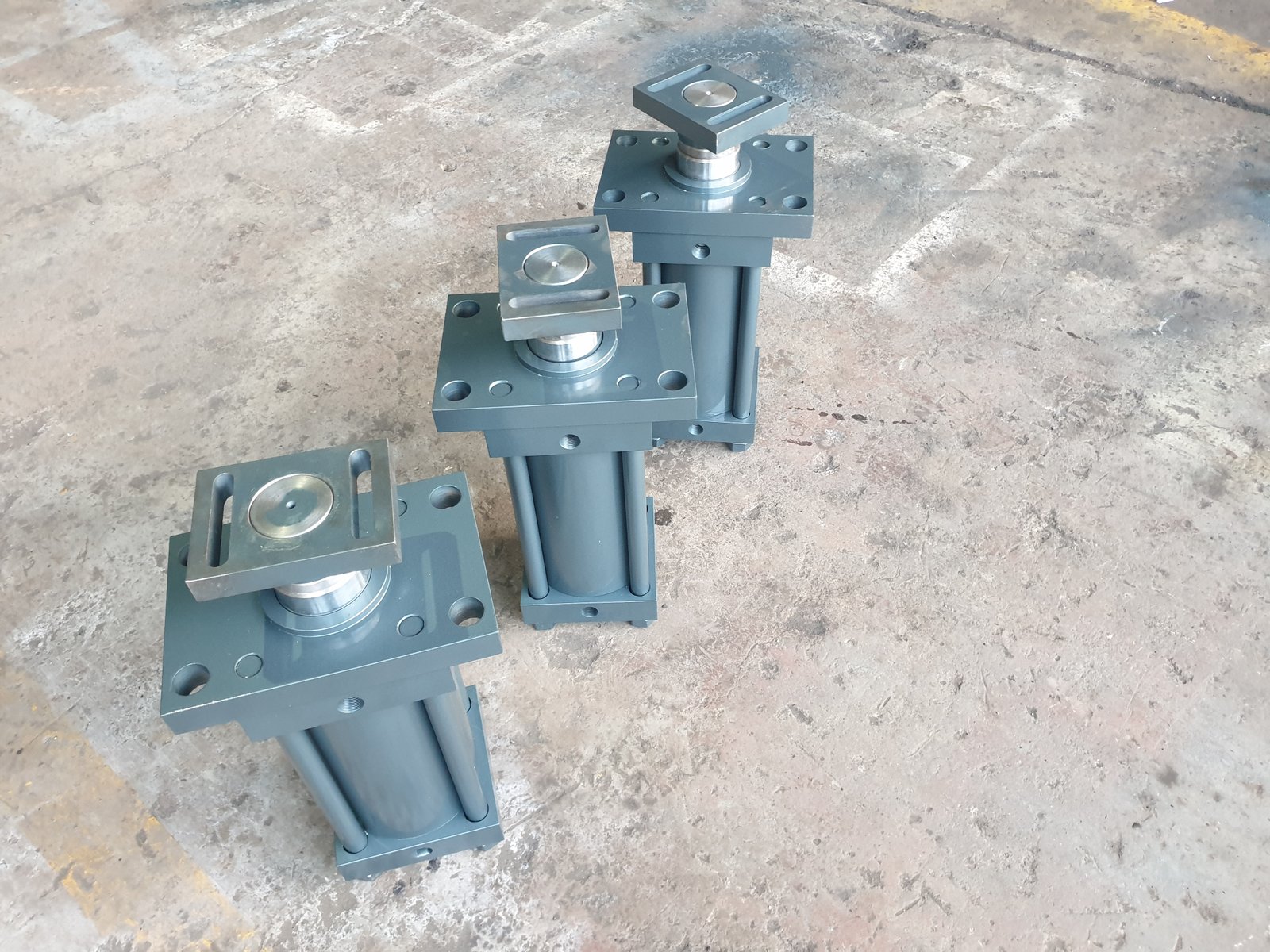 Overhead view of tie-rod Hydraulic Cylinders ready for dispatch, Desire Hydraulics Pune