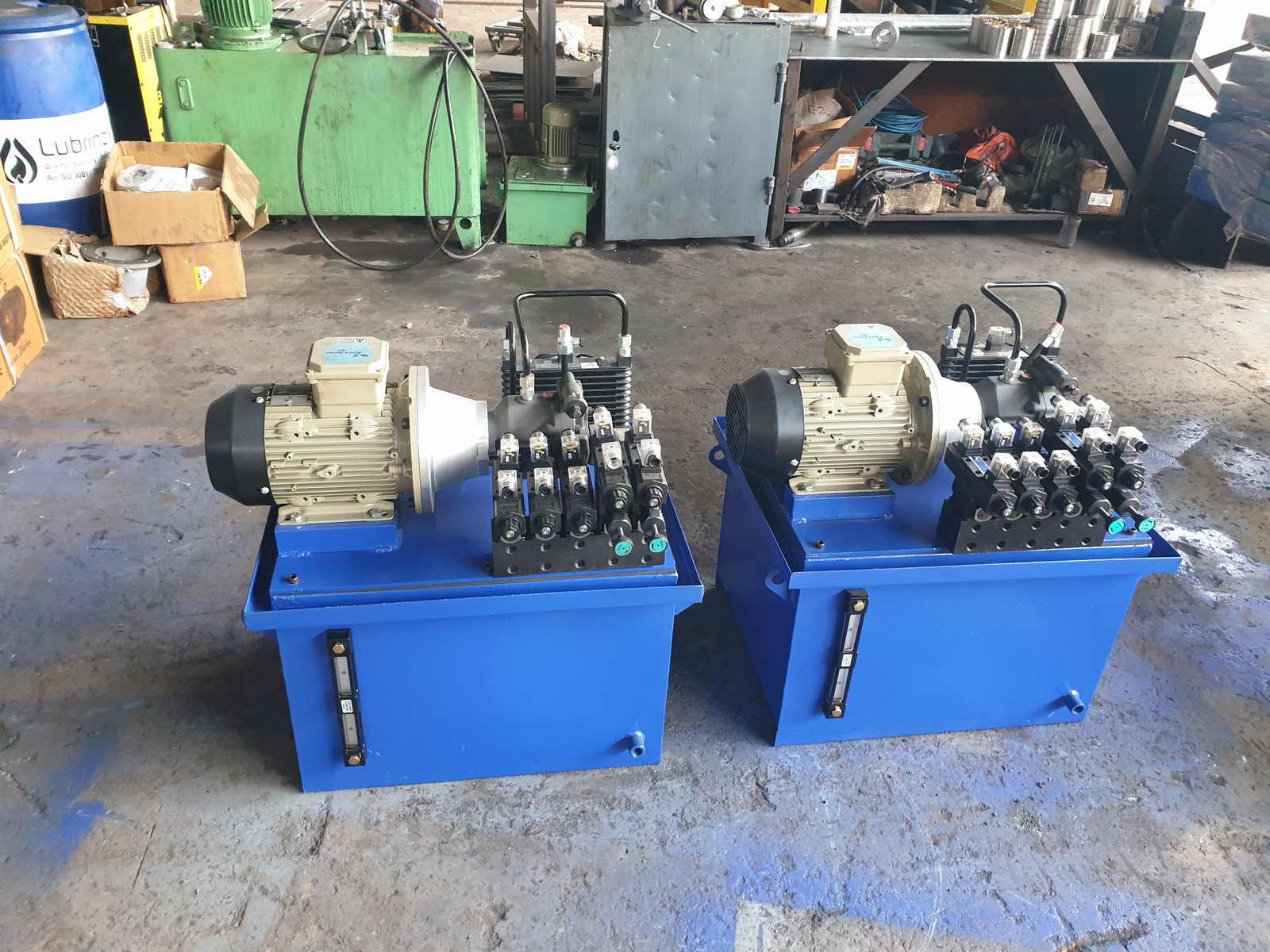 Pair of blue Hydraulic Power Packs with oil coolers and valve manifolds, Desire Hydraulics Pune