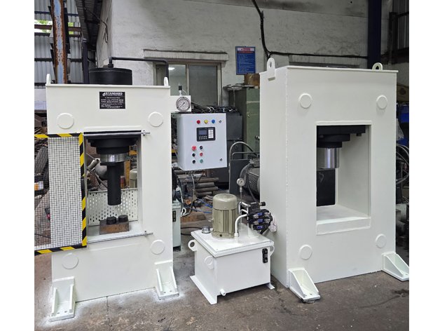 Compact Hydraulic Press Machine with mesh safety guard, manufactured by Desire Hydraulics