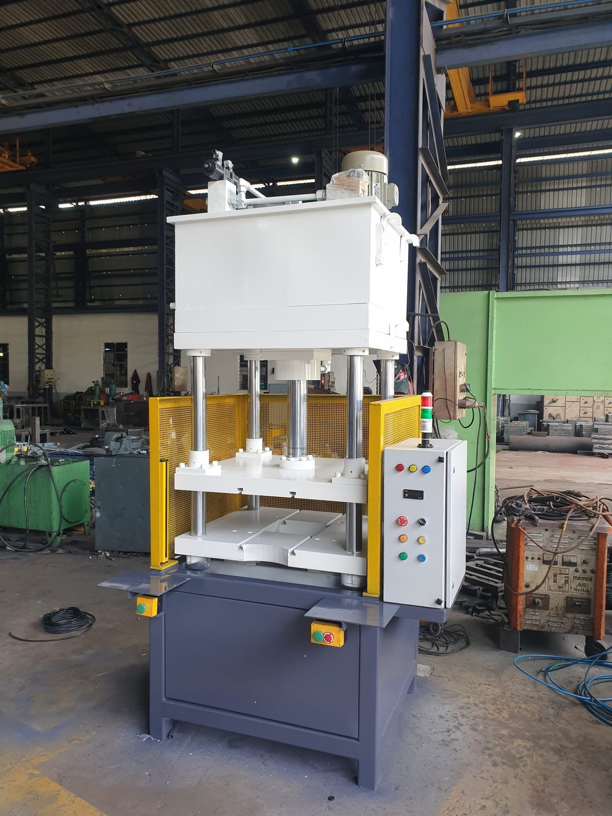 Finished hydraulic Trimming Press machine with mesh safety guard, Desire Hydraulics Pune