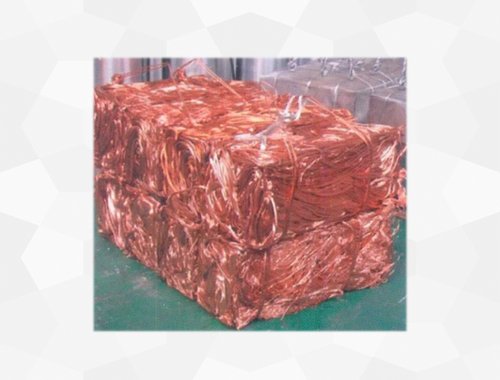 Copper wire scrap baled into compact bundles using a Desire Hydraulics Hydraulic Baler