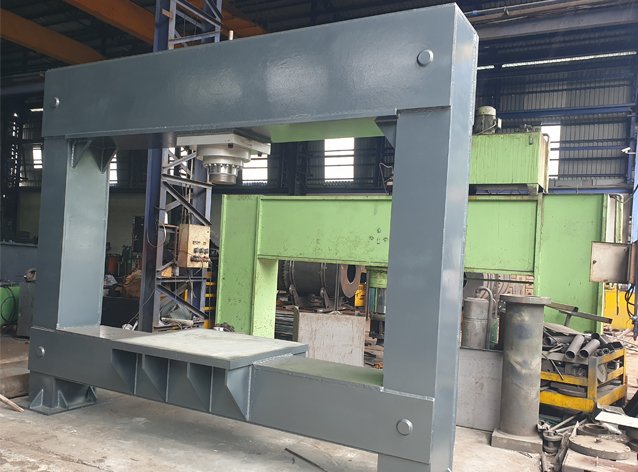 H-Frame hydraulic press machine on the assembly floor at Desire Hydraulics manufacturing unit, MIDC Bhosari, Pune