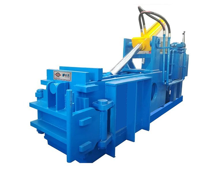 Hydraulic scrap baler machine with hydraulic cylinder and control cabinet, studio product shot by Desire Hydraulics